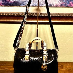 Michael Kors monogram black duffle purse
